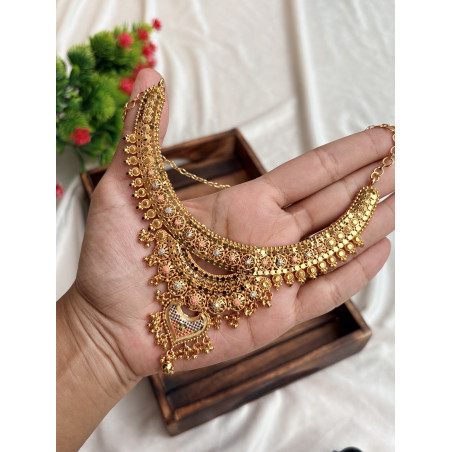 Gold Model Forming Heart Necklace